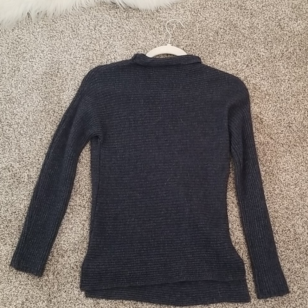 very modest navy blue sweater